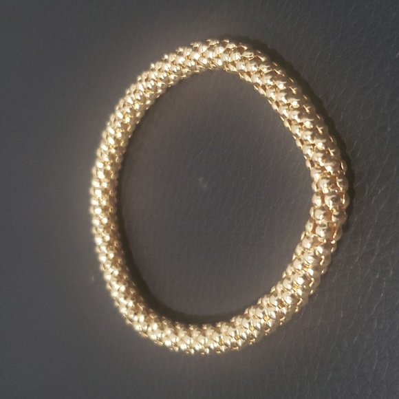 Elastic gold colored fashion bracelet - Picture 2 of 5